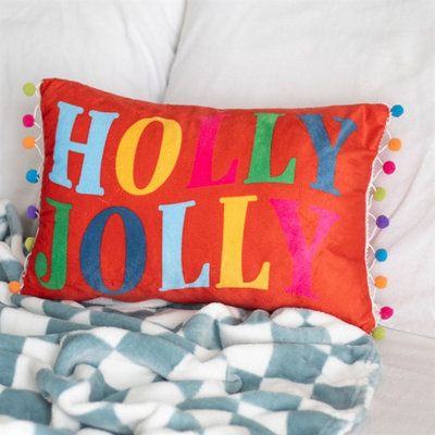 Red Holly Jolly Cushion With Pom PomsFestive Christmas Decor from B&Q