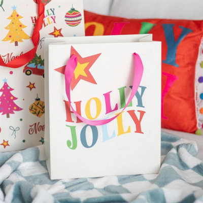 23Cm Holly Jolly Gift BagFestive & Colorful Holiday Wrap from B&Q