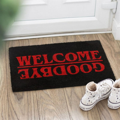 Black Welcome Goodbye Doormat With Red TextEerie Entryway Decor