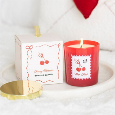 Mon Cheri Cherry Blossom CandleRomantic Scented Candle In Red Jar from B&Q