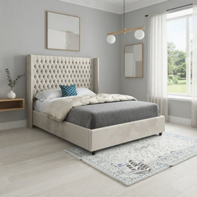 Wormbridge Winged Upholstered Beige Soft Velvet Designer Bed Frame from B&Q