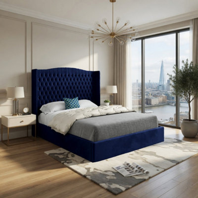 Stockport Winged Upholstered Blue Soft Velvet Designer Bed Frame from B&Q