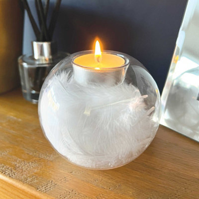 Oh So Precious Glass Feather Filled Tea Light Holder from B&Q