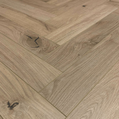 Chelsea Herringbone 12mm Laminate Flooring from B&Q