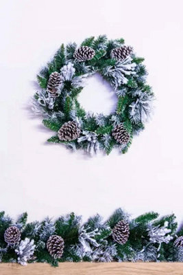 50cm Flocked Decorated Mixed Pine Wreath with Pine Cones