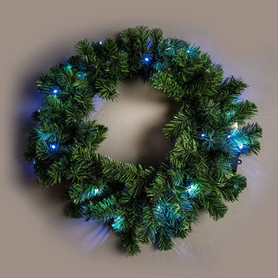 55cm Pre-Lit Green Christmas Wreath Alaskan Pine with 30 Ice White LEDs