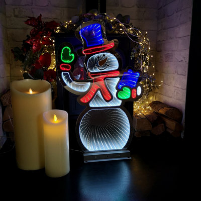 56cm Infinity Light up Standing Snowman Christmas Decoration with Multi Coloured LEDs on Metal Base Price Comparisons | Compare The Build