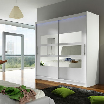 Bega Iii 180Cm Wardrobe With Hanging Rail Sliding Doors Shelves And Mirror Storage White With Led Lights from B&Q