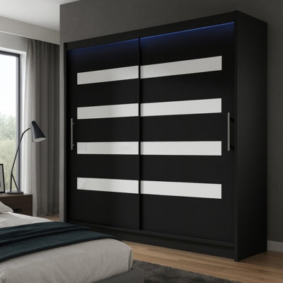 Bega Xi 180 Wardrobe With Sliding Doors Hanging Rail Shelves Black With White And Led Lights from B&Q