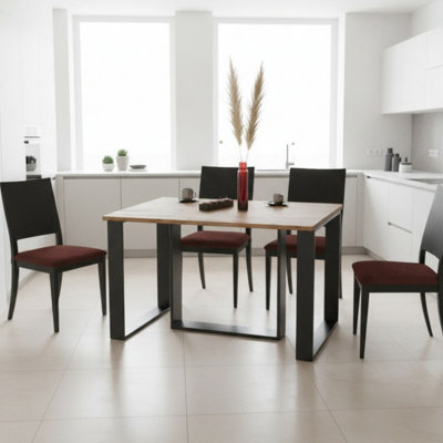 Borys Extendable Dining Table 130 And 210X80 Cm Modern Laminated Table With Black Legs Craft Oak from B&Q
