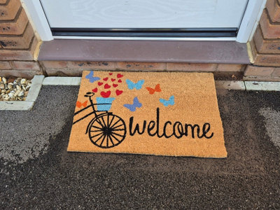 Coir Doormat 60Cm X 40Cm"welcome" With Butterfly And Bicycle DesignRubber Backing from B&Q