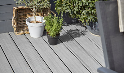 Grey painted garden decking.