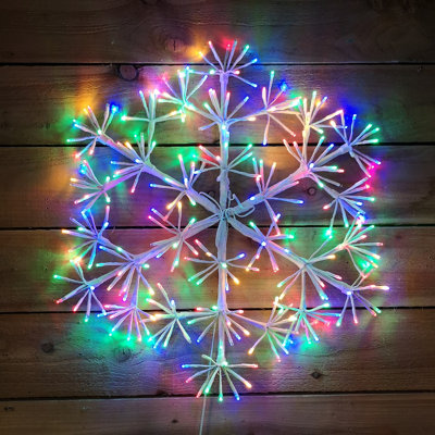 60cm Premier White Starburst Christmas Snowflake Multi Coloured twinkling lights.