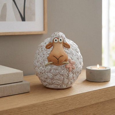 Garden Greatness Sheep Holding Flower Ornament Resin from B&Q