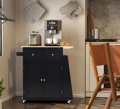 A black kitchen trolley in a cream kitchen.