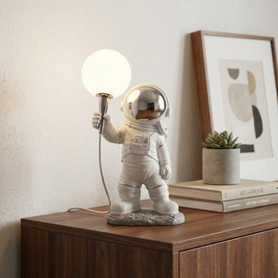B&Q -  Astronaut Moon Warm Glow Lamp Resin