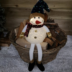 70cm Sitting Light Up Christmas Snowman with Dangly Legs in Warm White LEDs