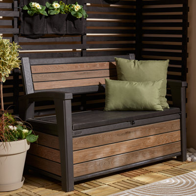 Wooden garden storage bench for storing outdoor cushions and tools