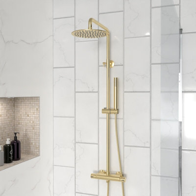 Nes Home Modern Brushed Brass Cool Touch Thermostatic Riser Rail Shower Set from B&Q