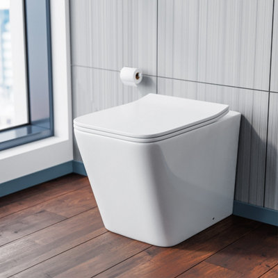 Nes Home Rimless Back To Wall Toilet Pan With Uf Toilet Seat from B&Q