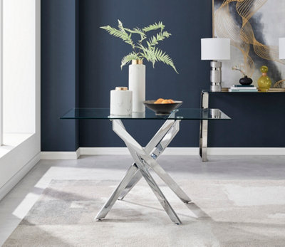 Furniturebox Leonardo 4 Seater Rectangular Glass Dining Table With Silver Chrome Metal Angled Starburst Legs For Modern Minimalist Dining Room from B&Q