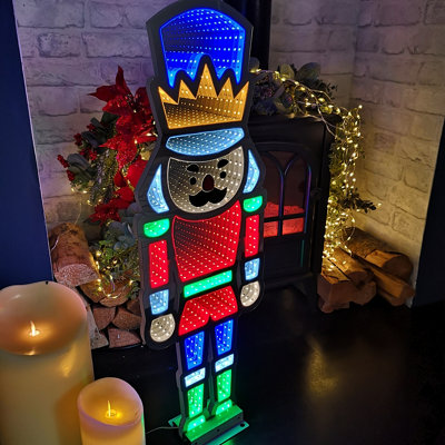 74cm Infinity Light up Christmas Nutcracker Decoration with Multi Coloured LEDs on Metal Base
