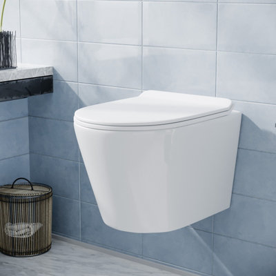 Nes Home Tornado Flush White Round Wall Hung Rimless Toilet Pan With Slim Seat from B&Q