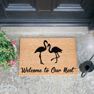 Artsy Doormats Welcome To Our Nest Flamingo Doormat from B&Q