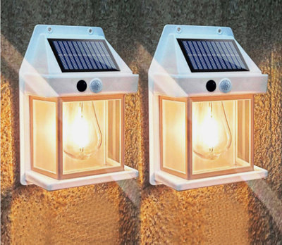 2X Solar Wall Fence Lights Lantern Motion Sensor Outdoor Garden Security Lamp from B&Q