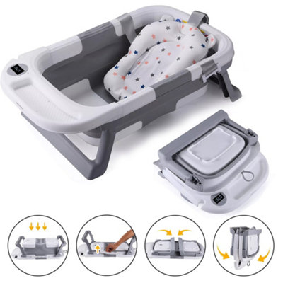 Foldable Baby Bath Tub Ergonomic With Temperature And Cushion Bath Pad from B&Q