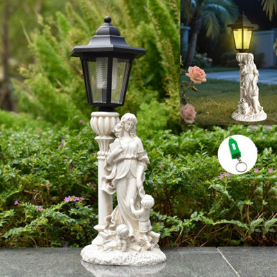Solar Led Garden Statue: Elegant Family Resin Ornament With Lantern LightWeatherproof from B&Q