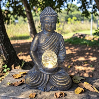 28Cm Solar Buddha Statue Led Crackle Ball Garden Ornament from B&Q