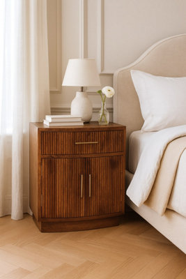 Artisan Furniture Solid Wood Curved Ribbed Bedside With Drawer And Shelves from B&Q