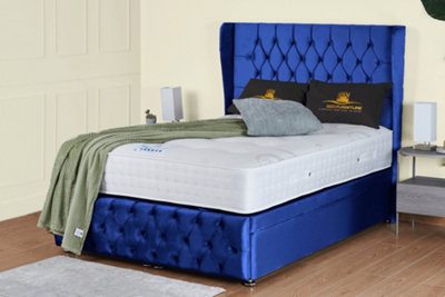 UKBEDFURNITURE Edwina Plush Blue End Opening Divan Ottoman Bed With 54 Inch Headboard & 10 Inch Orthopaedic Mattress from B&Q