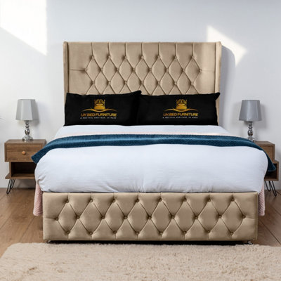 UKBEDFURNITURE Luxor Beige Plush Wingback Divan Bed Base With 54 Inch HeadboardNo Storage from B&Q