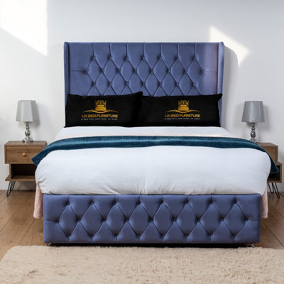 UKBEDFURNITURE Luxor Blue Plush Wingback Divan Bed Base With 54 Inch Headboard & 10 Inch Orthopaedic MattressNo Storage from B&Q