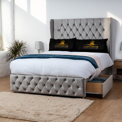 UKBEDFURNITURE Luxor Grey Plush Wingback Divan Bed With 2 Foot End Drawers & 54 Inch Headboard from B&Q