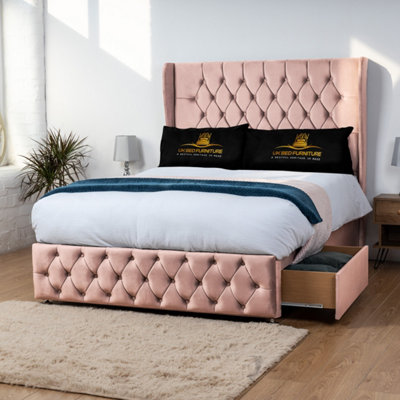 UKBEDFURNITURE Luxor Pink Plush Wingback Divan Bed 2 Foot End Drawers With 10 Inch Orthopaedic Mattress & 54 Inch Headboard from B&Q