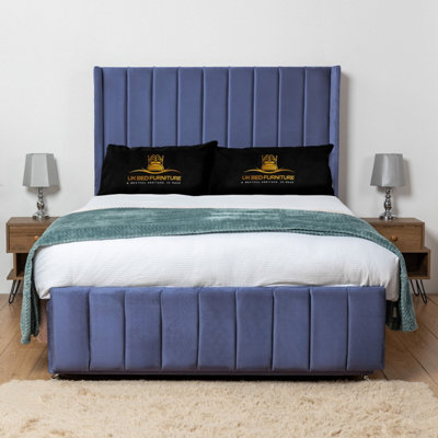 UKBEDFURNITURE Arizona Blue Plush Wingback Divan Bed Base With 54 Inch HeadboardNo Storage from B&Q