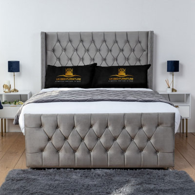 UKBEDFURNITURE Emily Grey Plush Wingback Divan Bed Base With 54 Inch Headboard & 10 Inch Orthopaedic MattressNo Storage from B&Q