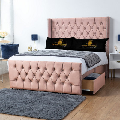 UKBEDFURNITURE Emily Pink Plush Wingback Divan Bed With 2 Foot End Drawers & 54 Inch Headboard from B&Q