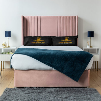 UKBEDFURNITURE Skyline Pink Plush Wingback Divan Bed Base With 54 Inch HeadboardNo Storage from B&Q