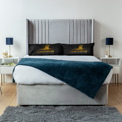 UKBEDFURNITURE Skyline Silver Plush Wingback Divan Bed Base With 54 Inch Headboard & 10 Inch Orthopaedic MattressNo Storage from B&Q