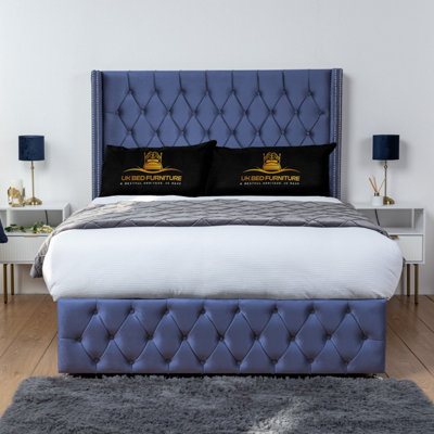 UKBEDFURNITURE Jasmine Blue Plush Wingback Divan Bed Base With 54 Inch Headboard & 10 Inch Orthopaedic MattressNo Storage from B&Q