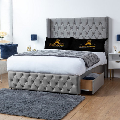 UKBEDFURNITURE Jasmine Grey Plush Wingback Divan Bed With 2 Foot End Drawers & 54 Inch Headboard from B&Q