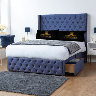 UKBEDFURNITURE Jasmine Blue Plush Wingback Divan Bed With 2 Foot End Drawers & 54 Inch Headboard from B&Q