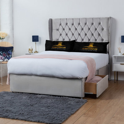 UKBEDFURNITURE Mary Silver Plush Wingback Divan Bed With 2 Foot End Drawers & 54 Inch Headboard from B&Q