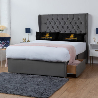 UKBEDFURNITURE Mary Steel Plush Wingback Divan Bed With 2 Foot End Drawers & 54 Inch Headboard from B&Q
