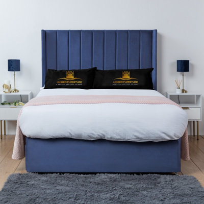 UKBEDFURNITURE Bella Blue Plush Wingback Divan Bed Base With 54 Inch HeadboardNo Storage from B&Q