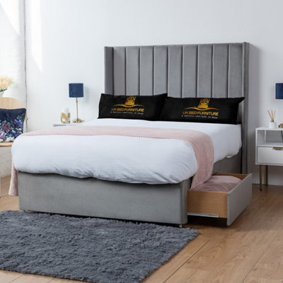 UKBEDFURNITURE Bella Grey Plush Wingback Divan Bed With 2 Foot End Drawers & 54 Inch Headboard from B&Q